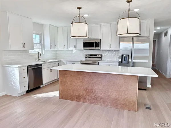 $299,000 | 409 Thouvenot Lane, New Baden, IL 62265