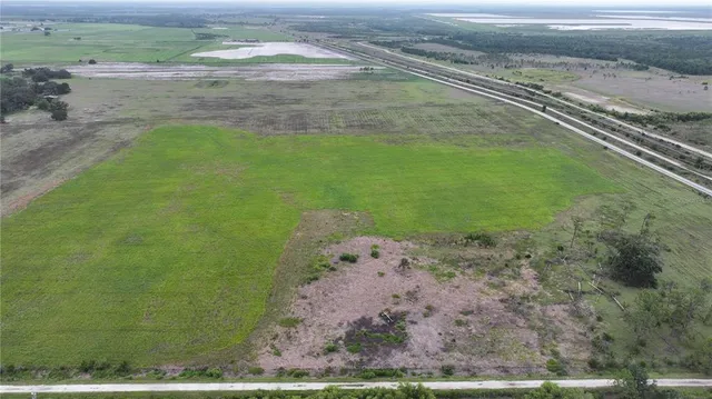 a view of a lake with beach