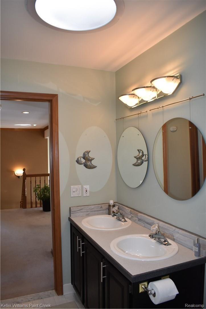 1993 Ridgefield Court Rochester, MI 48306 - Photo 34 of 47 THERE IS A LARGE FULL BATH ON THE 2ND FLOOR (5 X 10) WITH CONTAINS 2 SINKS, A CERAMIC FLOOR & A SKYLIGHT