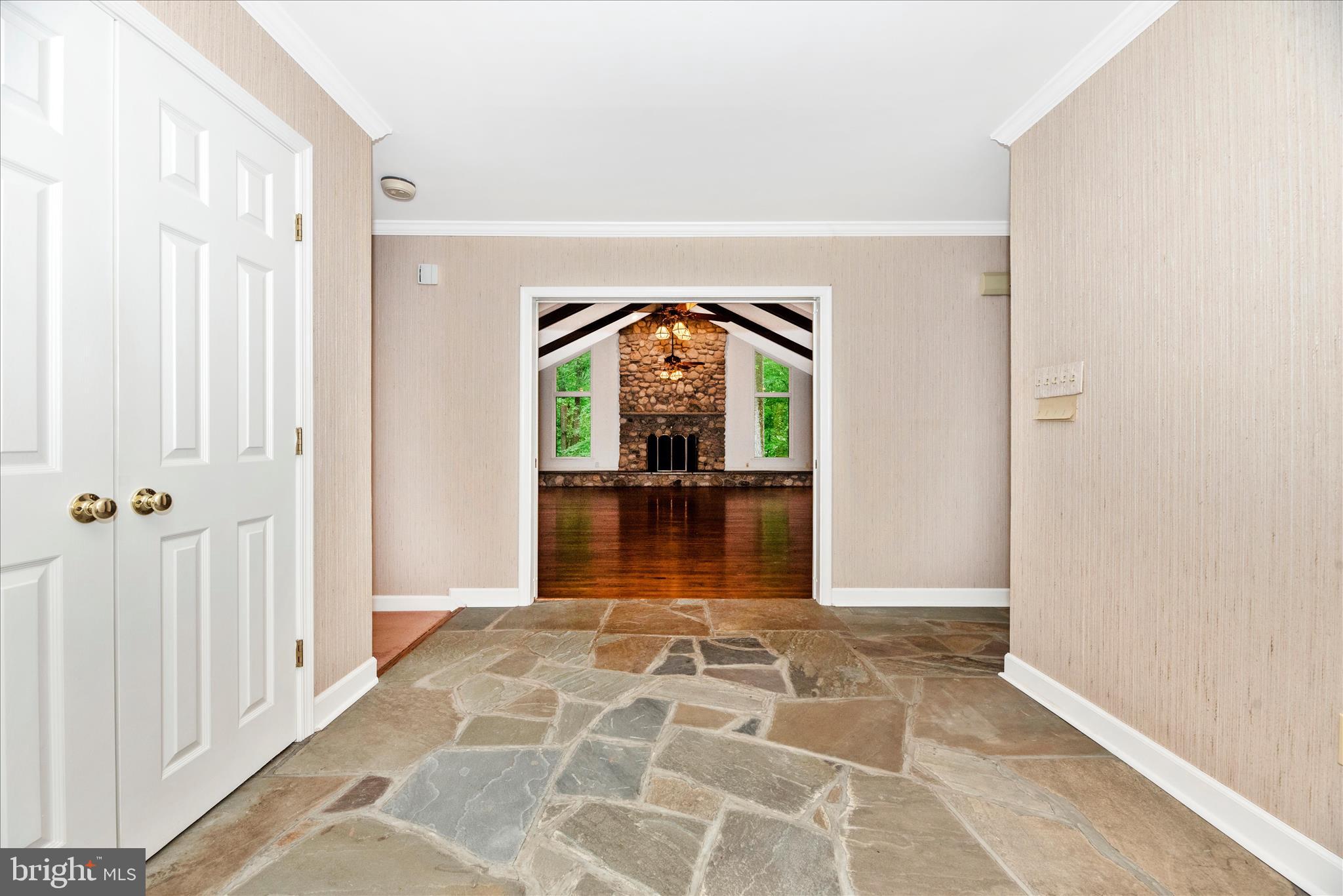 2221 Gold Mine Road Brookeville, MD 20833 - Photo 5 of 60 a view of a hallway with a window