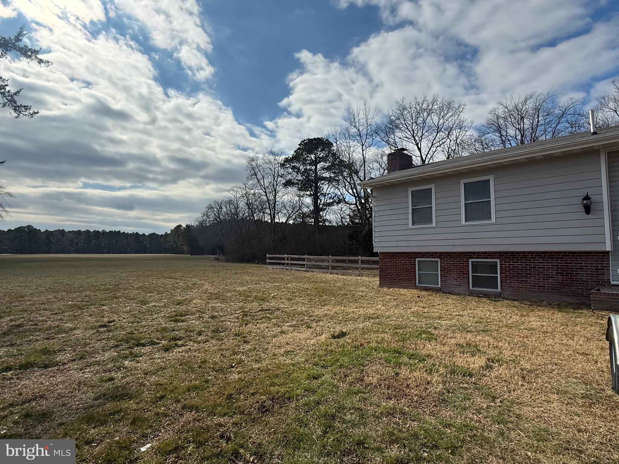 13830 Cooley Road Princess Anne, MD 21853 - Photo 3 of 7 a view of a house with a yard