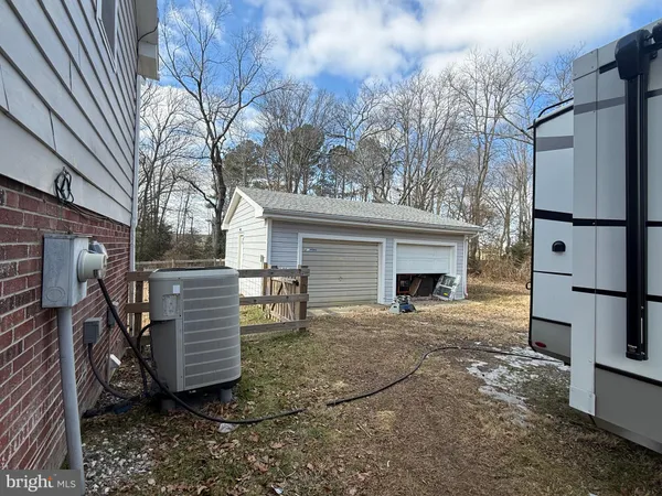 a view of a chairs in the patio