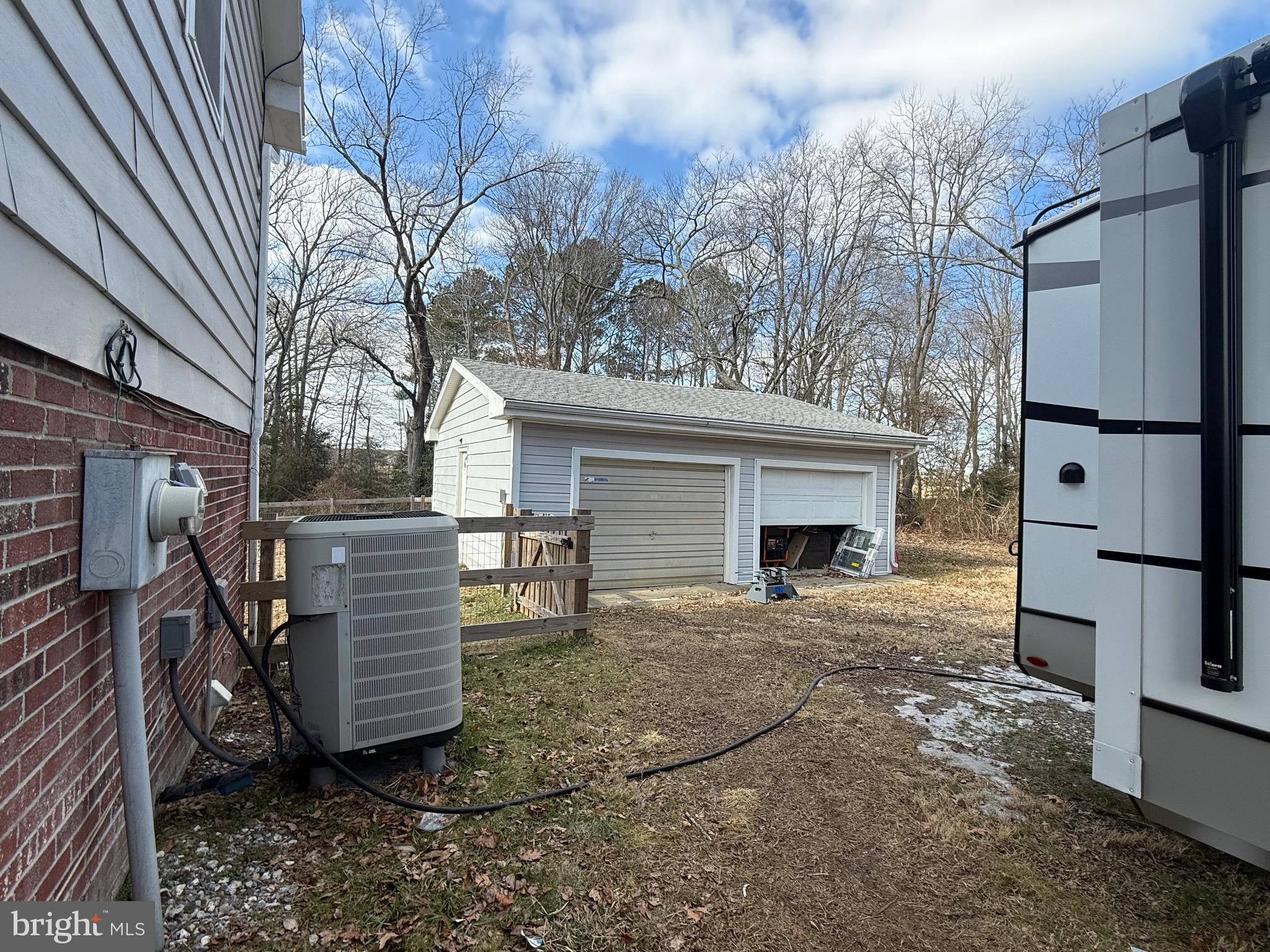 13830 Cooley Road Princess Anne, MD 21853 - Photo 4 of 7 a view of a chairs in the patio