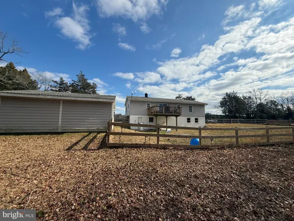 a house view with a backyard