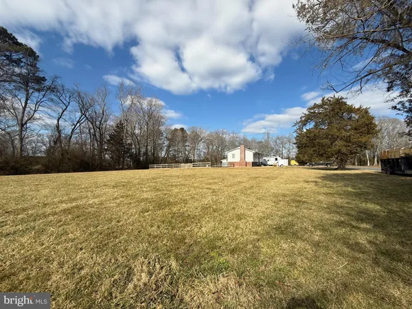 a view of yard and covered with snow
