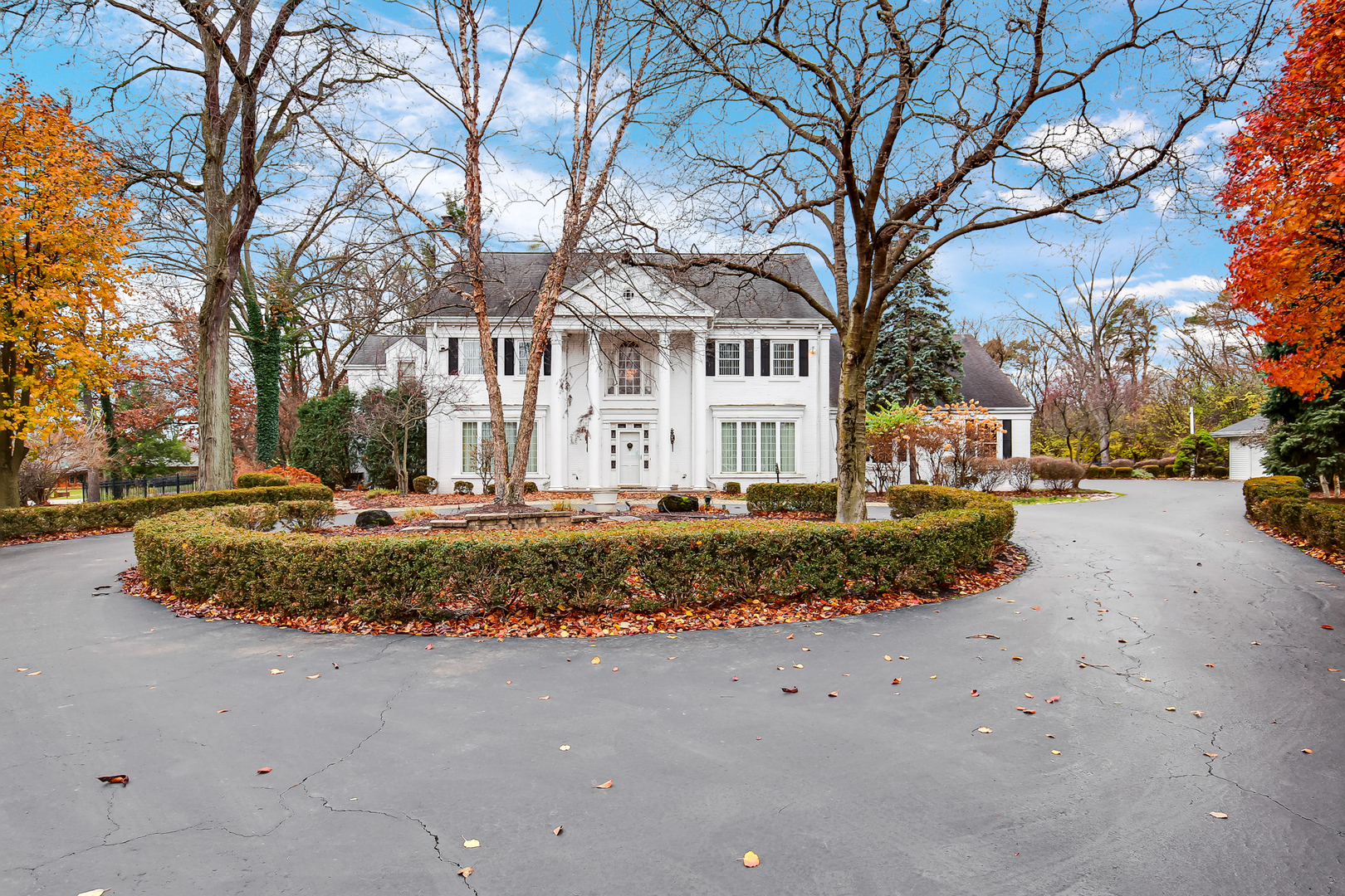 9S174 Drew Avenue Burr Ridge, IL 60527 - Photo 1 of 49 a view of a house with a yard covered in snow