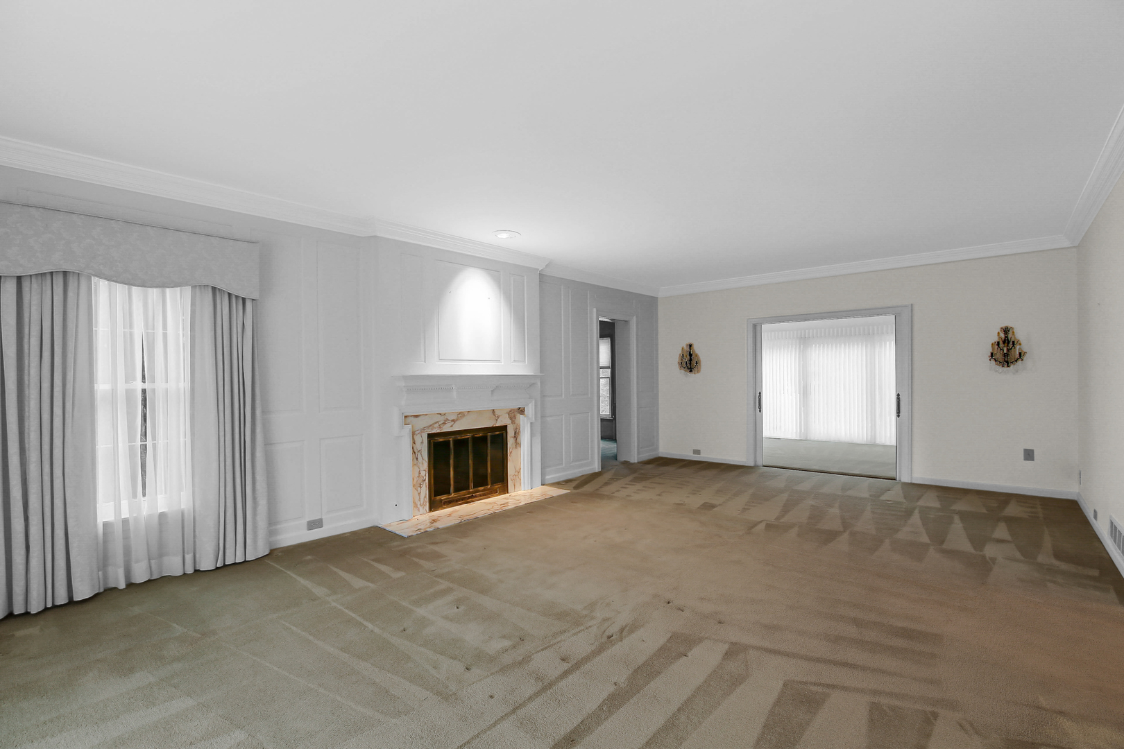 9S174 Drew Avenue Burr Ridge, IL 60527 - Photo 14 of 49 a view of empty room with window and fireplace