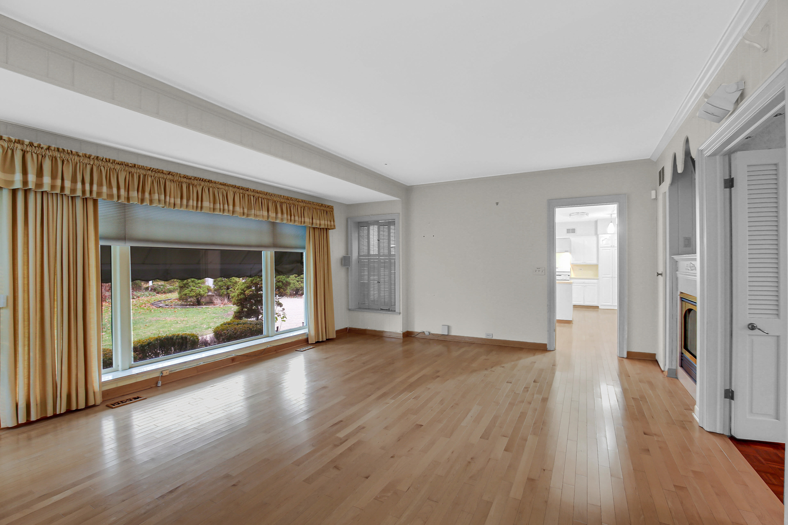 9S174 Drew Avenue Burr Ridge, IL 60527 - Photo 17 of 49 wooden floor in an empty room with a window