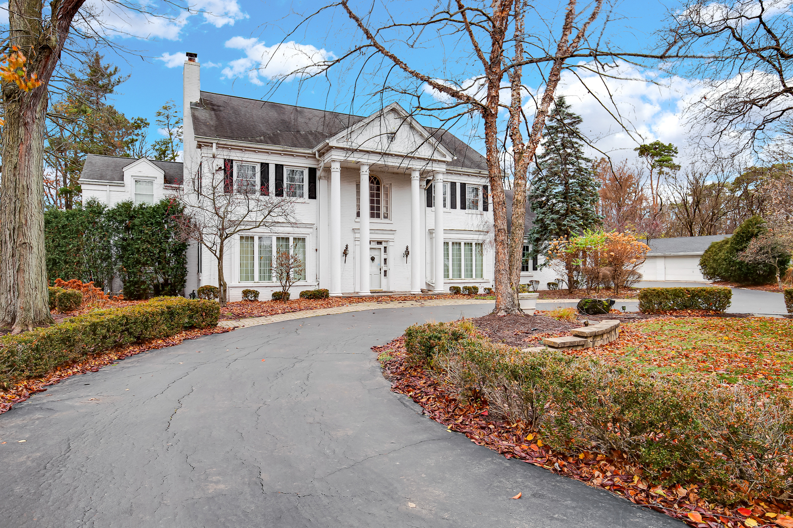 9S174 Drew Avenue Burr Ridge, IL 60527 - Photo 2 of 49 a front view of a house with sitting area