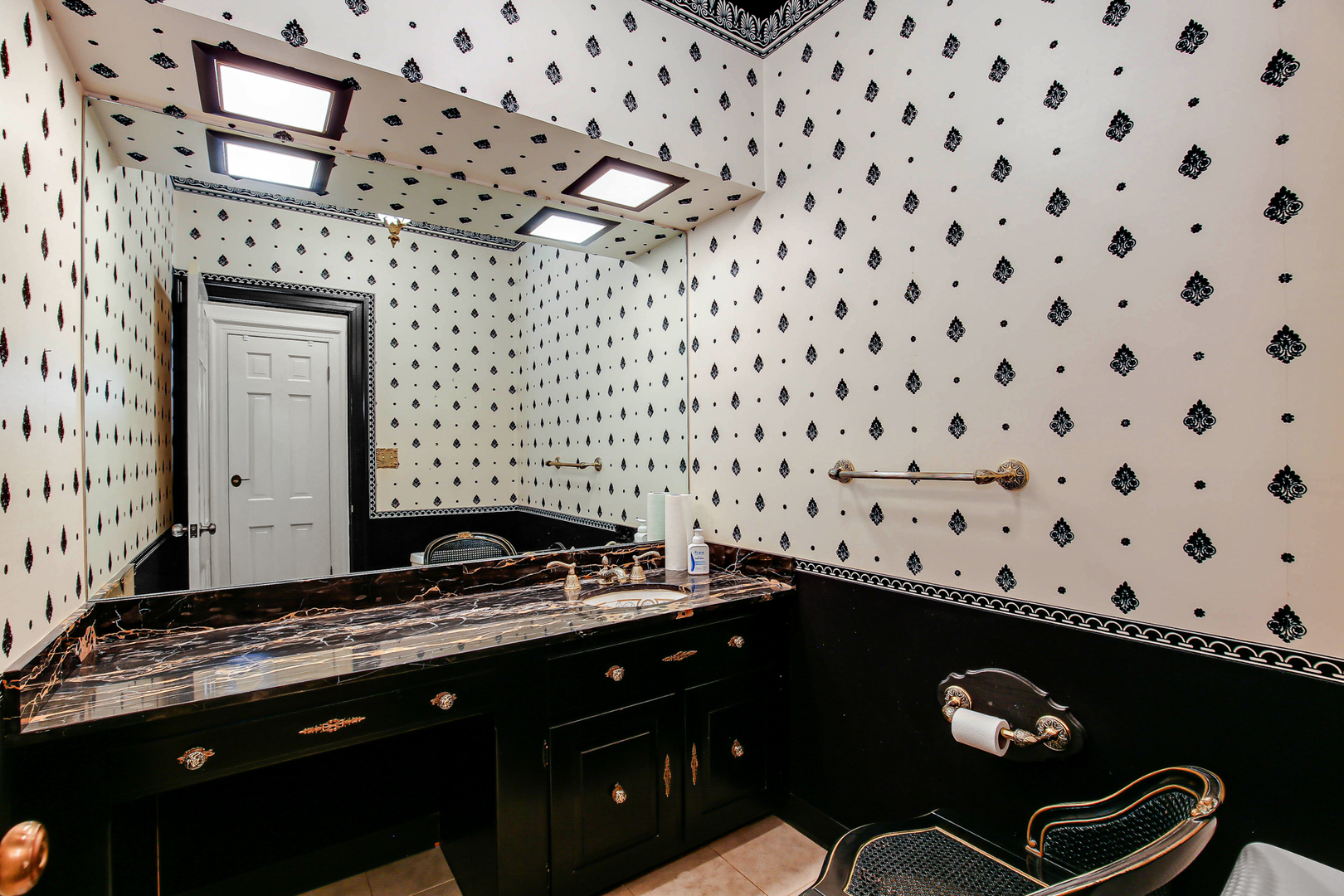 9S174 Drew Avenue Burr Ridge, IL 60527 - Photo 24 of 49 a granite counter top with a stove and a microwave