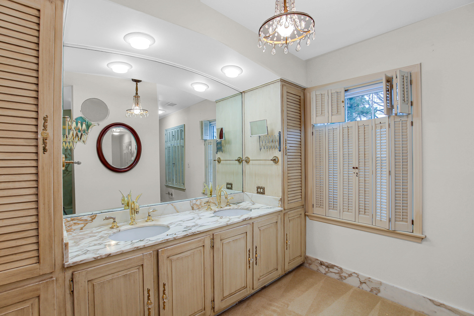 9S174 Drew Avenue Burr Ridge, IL 60527 - Photo 30 of 49 a bathroom with a granite countertop double vanity sink and a mirror