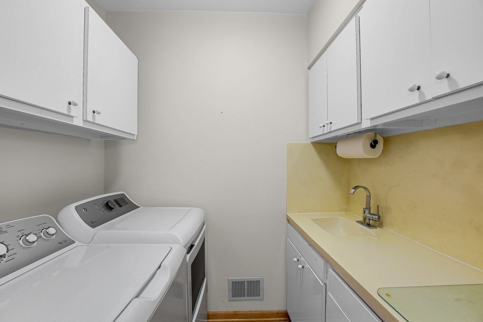 9S174 Drew Avenue Burr Ridge, IL 60527 - Photo 40 of 49 a bathroom with a sink and cabinets
