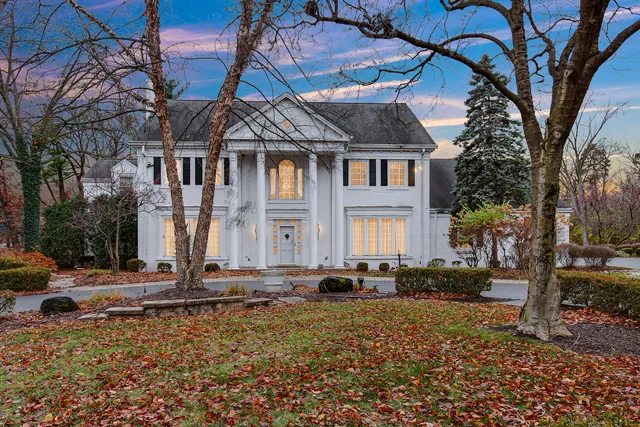 a view of a house with a road
