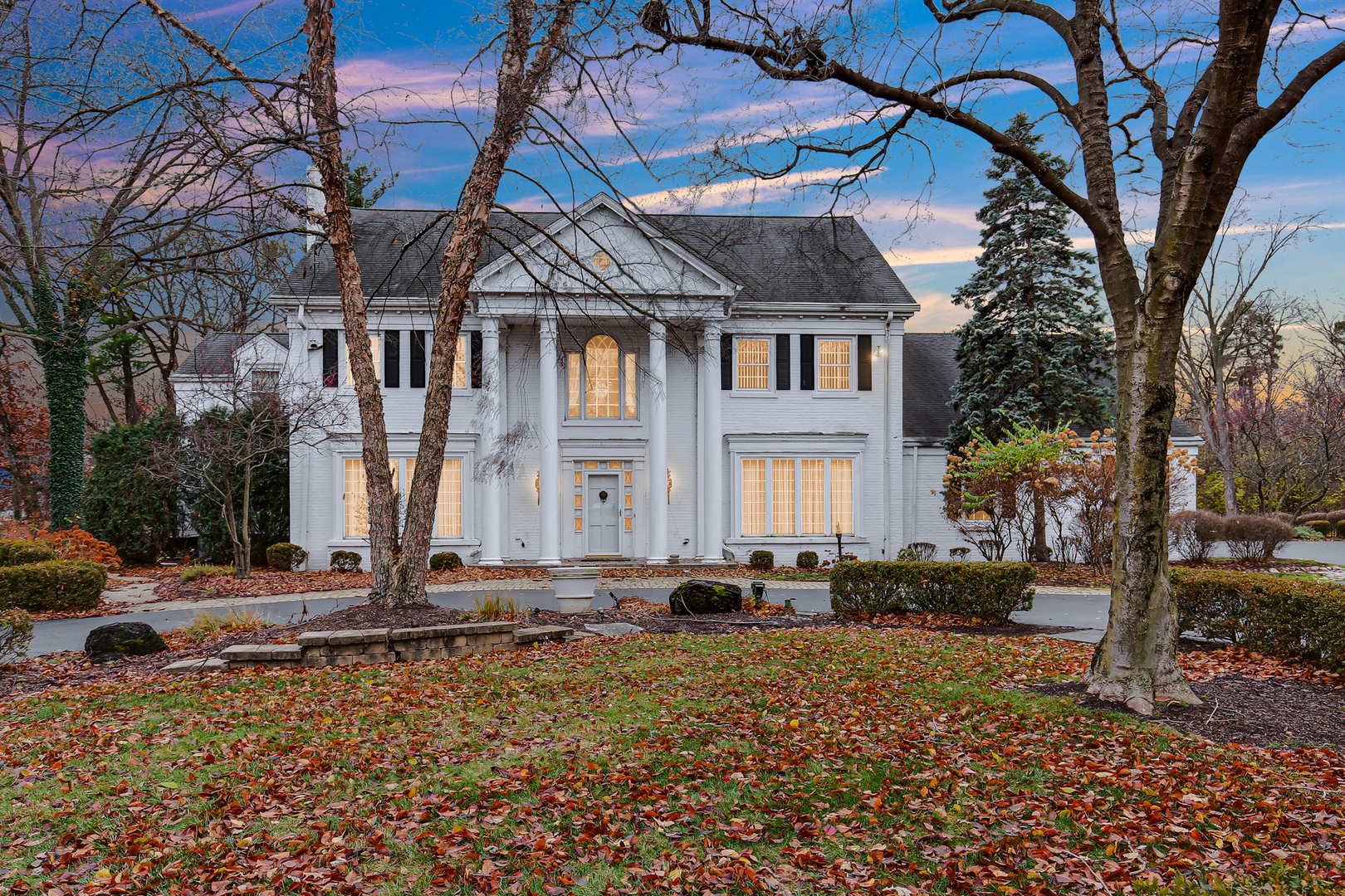9S174 Drew Avenue Burr Ridge, IL 60527 - Photo 42 of 49 a front view of a house with a yard