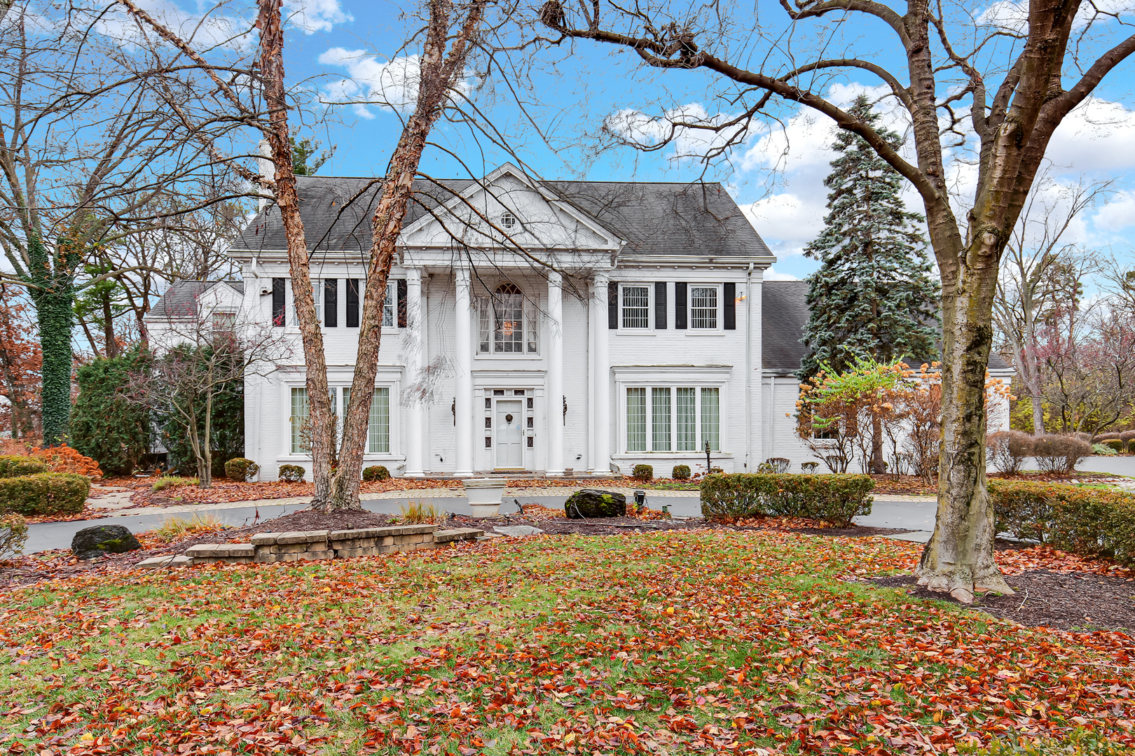 9S174 Drew Avenue Burr Ridge, IL 60527 - Photo 43 of 49 a front view of a house with street view