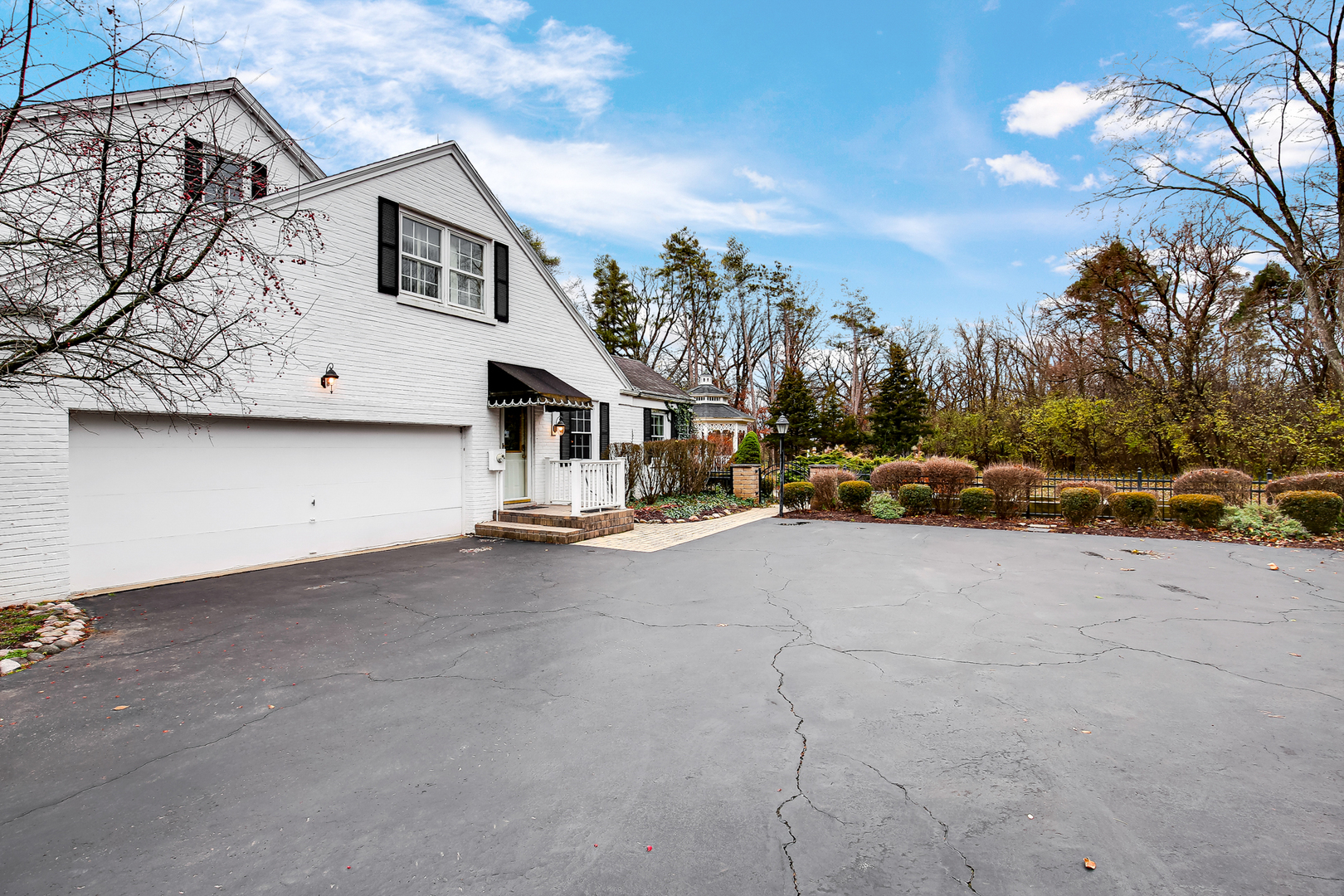 9S174 Drew Avenue Burr Ridge, IL 60527 - Photo 45 of 49 a view of a house with a road