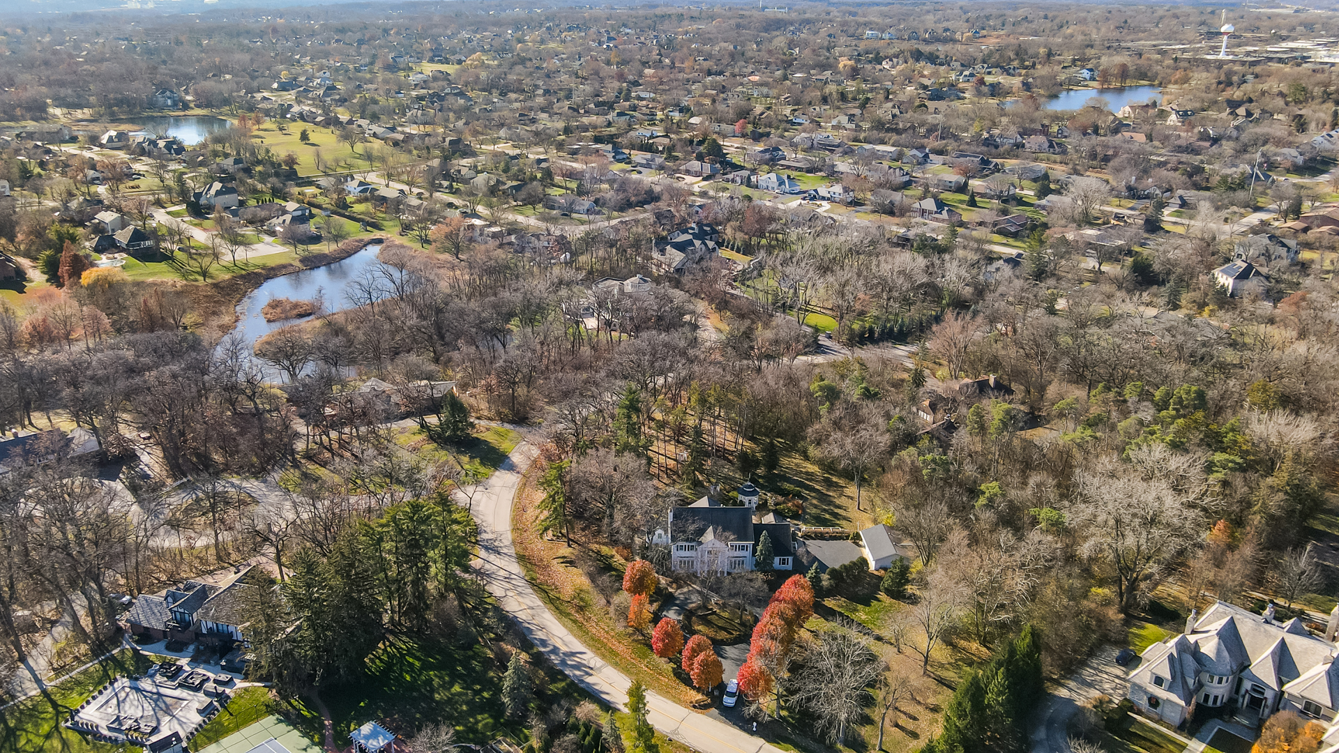 9S174 Drew Avenue Burr Ridge, IL 60527 - Photo 48 of 49 an aerial view of house with yard and mountain view in back