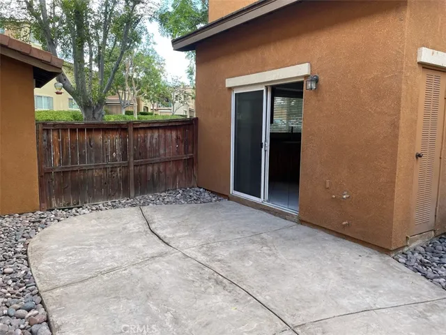 a backyard of a house with seating space
