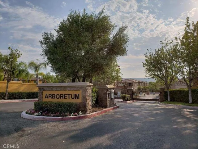 a sign on a pole on a street