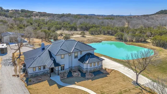 $890,000 | 1048 Mountain Bluebird Court, Graford, TX 76449