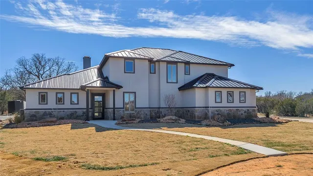 $890,000 | 1048 Mountain Bluebird Court, Graford, TX 76449
