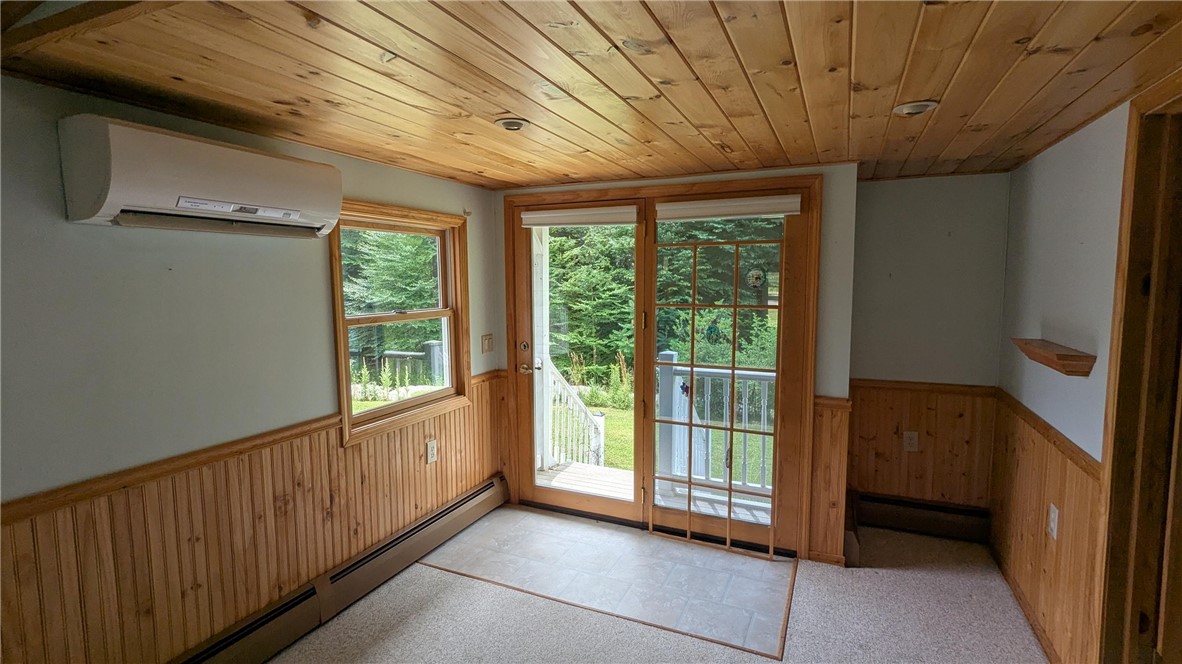 683 Lower 3rd Brook Road Walton, NY 13856 - Photo 9 of 27 another view of living room, split for comfort all year long, Atrium door to back yard