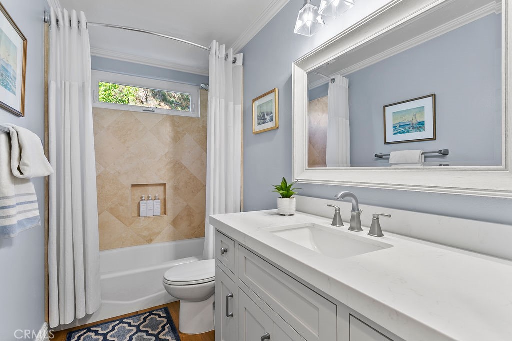 1 White Sail Laguna Niguel, CA 92677 - Photo 14 of 50 a bathroom with a sink a toilet and shower