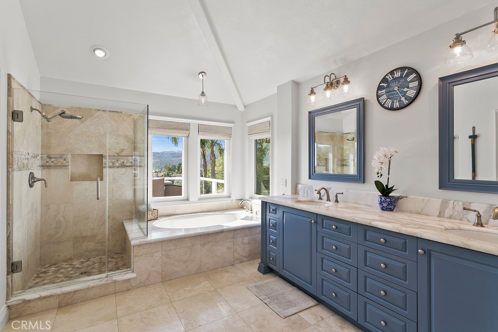 1 White Sail Laguna Niguel, CA 92677 - Photo 20 of 50 a spacious bathroom with a double vanity sink mirror and shower