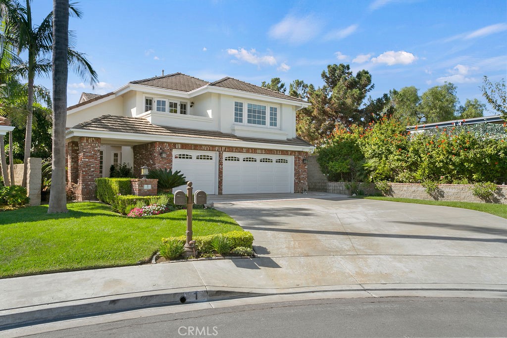 1 White Sail Laguna Niguel, CA 92677 - Photo 2 of 50 a front view of a house with a yard