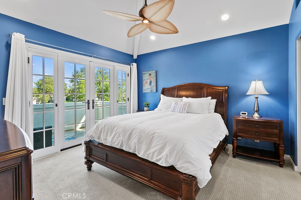 1 White Sail Laguna Niguel, CA 92677 - Photo 23 of 50 a bedroom with a bed lamp and a large window