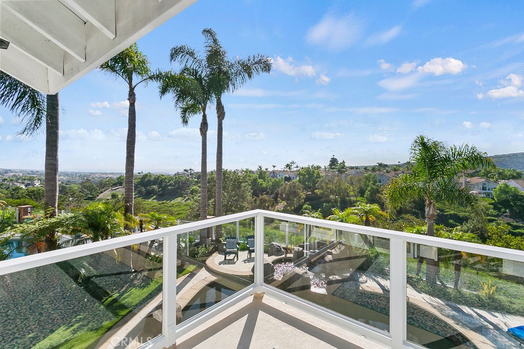 1 White Sail Laguna Niguel, CA 92677 - Photo 25 of 50 a view of a balcony with mountain view and wooden floor