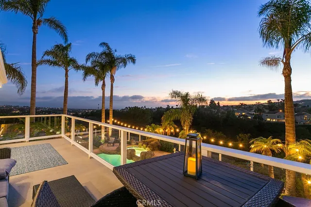 a view of a balcony with chairs