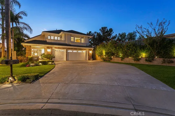 a sign board on the side of a street