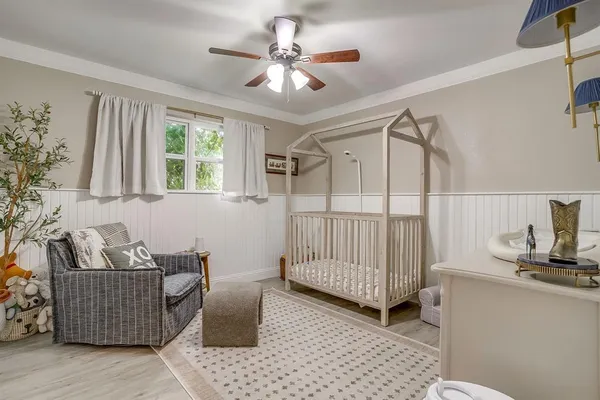 a room with furniture and white walls
