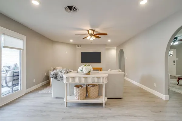 a workspace with furniture and wooden floor