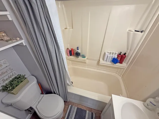 a bathroom with a sink and a toilet