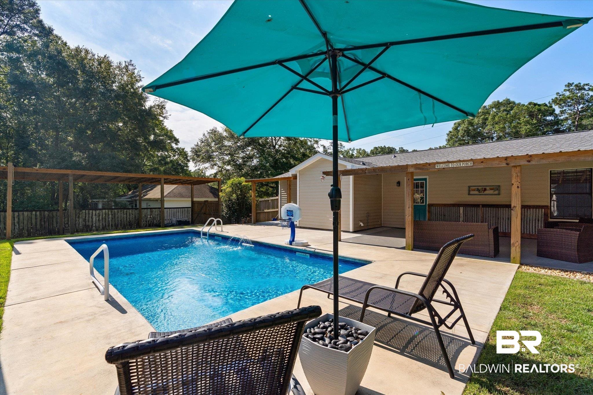 123 Richmond Road Daphne, AL 36526 - Photo 23 of 35 View of swimming pool with a patio area and an outdoor living space