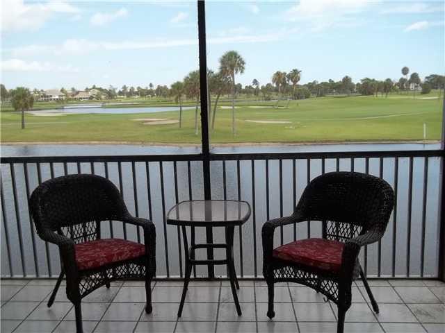 40 Northeast Plantation Road, Unit 217 Stuart, FL 34996 - Photo 5 of 6 a view of a chairs in the roof deck