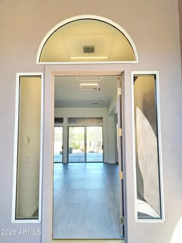 a view of a swimming pool with a lounge chairs