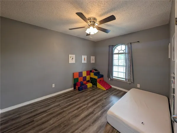a living room with furniture and window