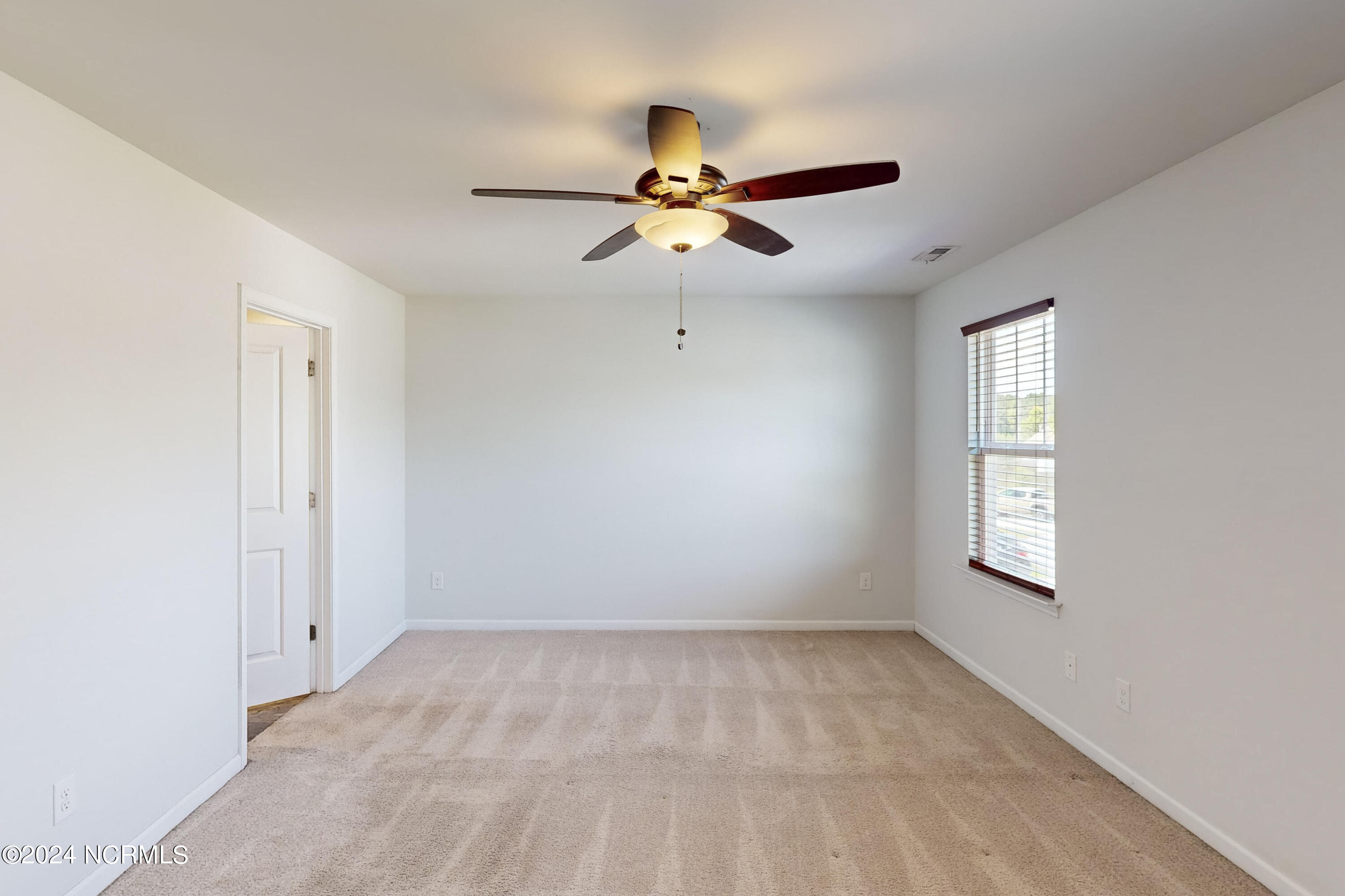 405 Saxby Way Holly Ridge, NC 28445 - Photo 40 of 54 Primary Bedroom