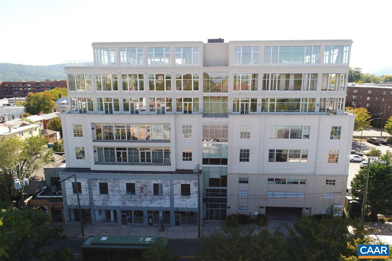 218 West Water Street, Unit 801 Charlottesville, VA 22902 - Photo 9 of 32 a view of a building with a garden and plants