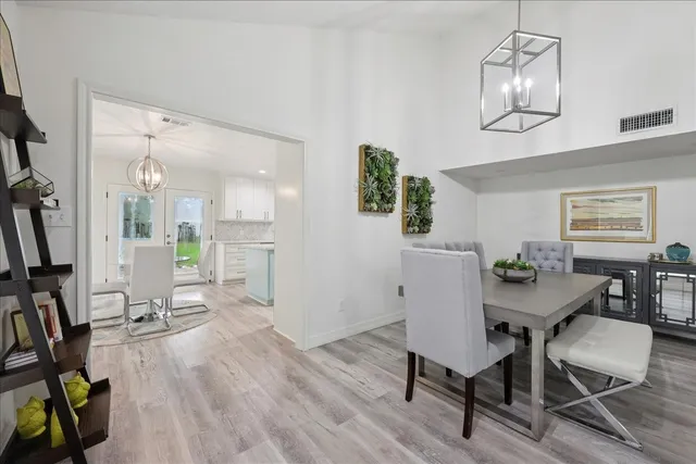 a workspace with furniture and wooden floor