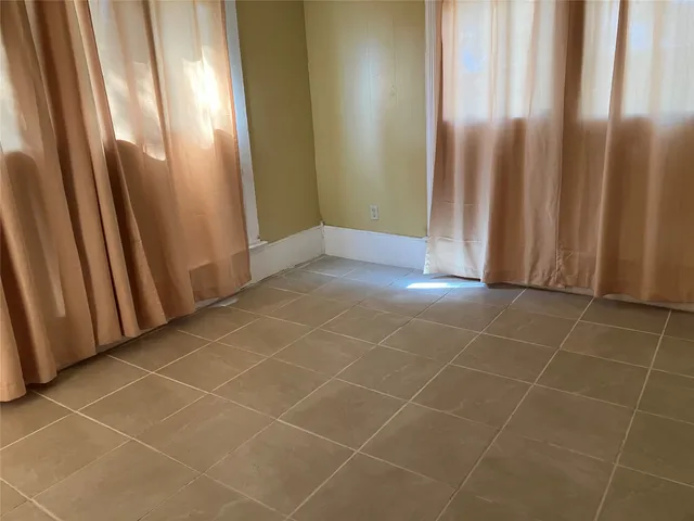 a view of a door and a window in a room