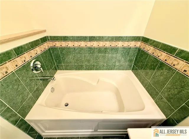 a view of a swimming pool with a balcony