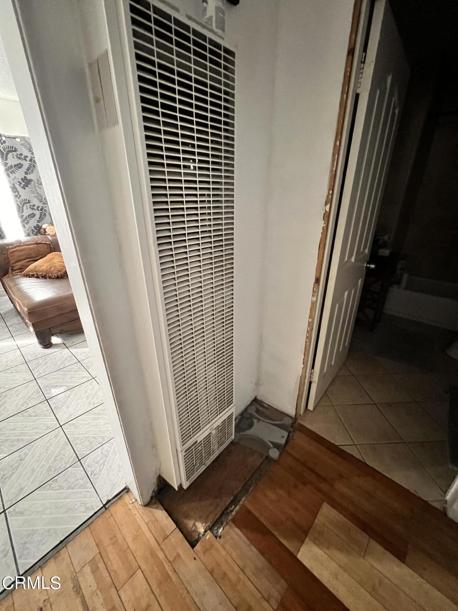 1017 King Street Oxnard, CA 93030 - Photo 17 of 22 a view of an empty room with wooden floor