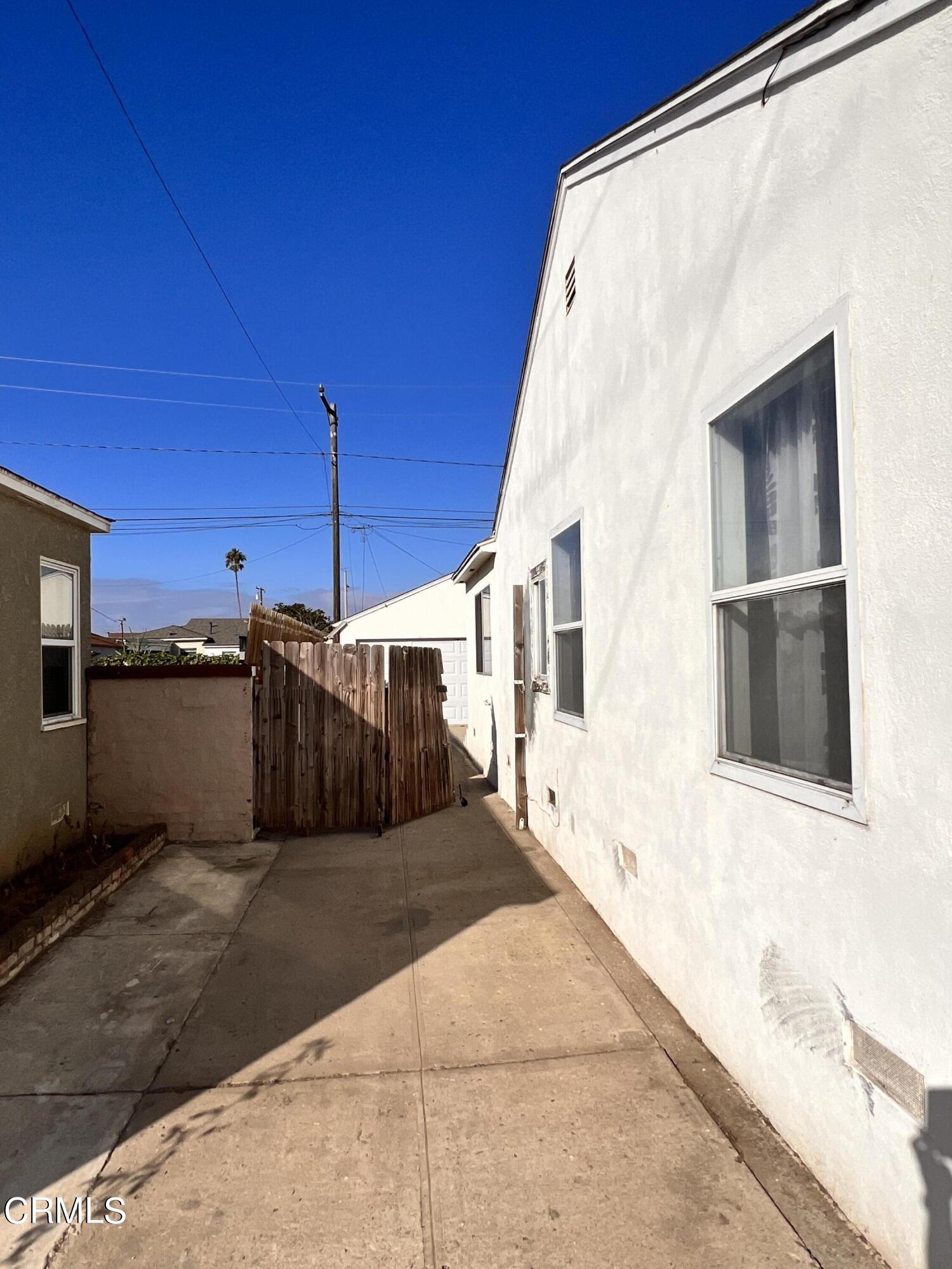 1017 King Street Oxnard, CA 93030 - Photo 19 of 22 a view of a back yard of the house