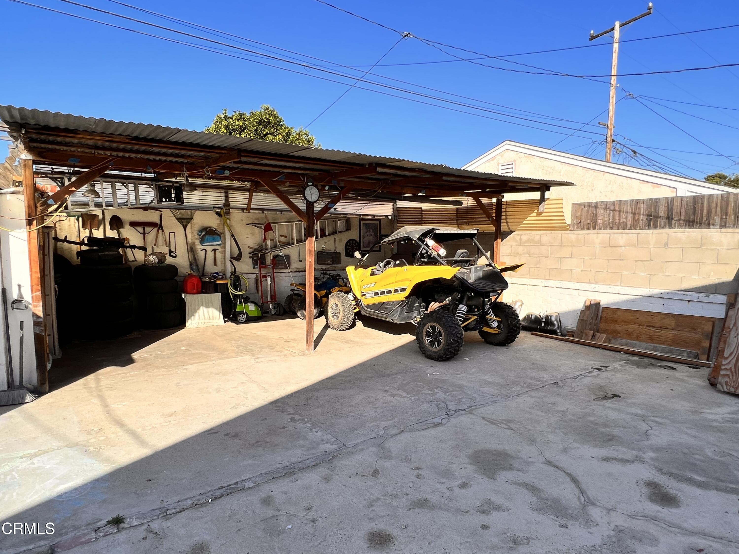 1017 King Street Oxnard, CA 93030 - Photo 22 of 22 a view of a garage with parked cars