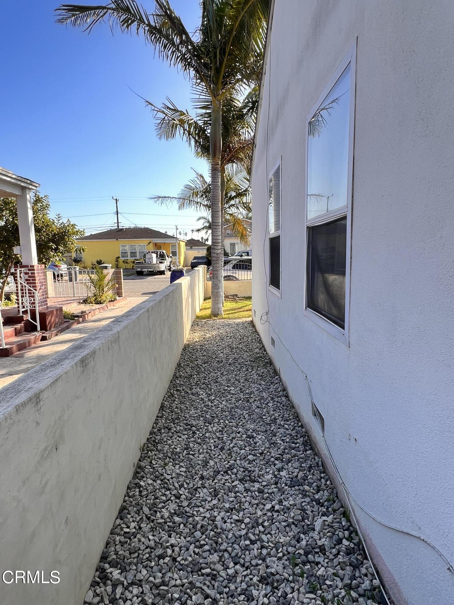 1017 King Street Oxnard, CA 93030 - Photo 5 of 22 a large white kitchen with a large window