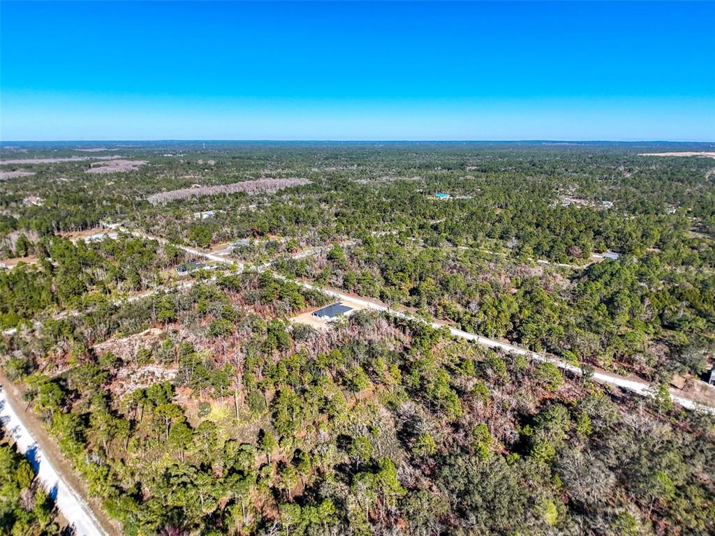 18079 Ramsey Road Weeki Wachee, FL 34614 - Photo 36 of 37 an aerial view of residential houses with city view